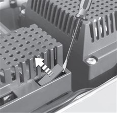 1. Pry off the plastic cover for the battery connector