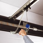 Mounting the arm to the garage door panel