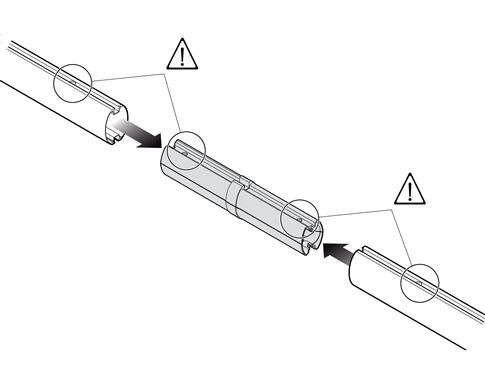 1. Insert the XBA9 connector into both arms, aligning the holes in the arms with the holes in the connector: 1. Insert the XBA9 connector into both arms, aligning the holes in the arms with the holes in the connector: