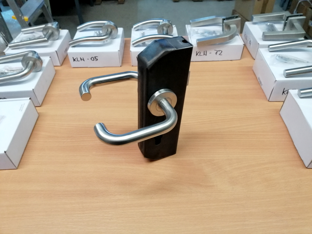 Rounded stainless steel lever handle with a straight lever Rounded stainless steel lever handle with a straight lever