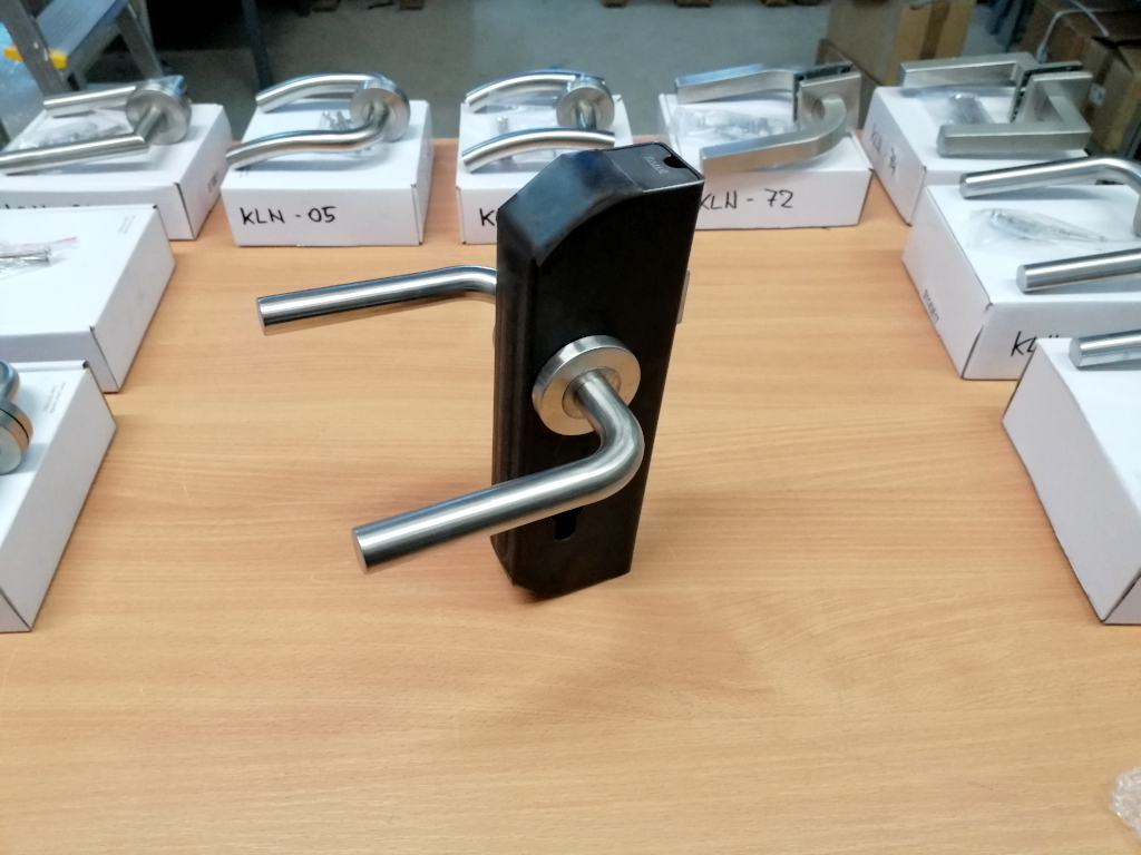 Stainless steel handle with a straight lever and rounded corner Stainless steel handle with a straight lever and rounded corner